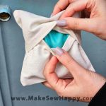 کیسه نمک پارچه‌ای شماره‌دوزی طرح گل قرمز