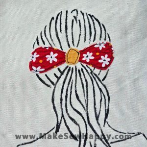 توت بگ طرح زن با گیره موی قرمز، خوشحالی بسازیم