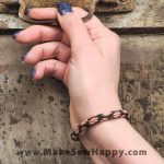 دستبند نخی طرح گل رنگ سبز یشمی و صورتی