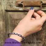 دستبند نخی طرح ضربدر رنگ طوسی و صورتی و سبز روشن