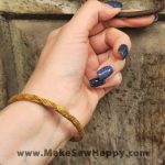 دستبند نخی طرح ضربدر رنگ زرد و نارنجی