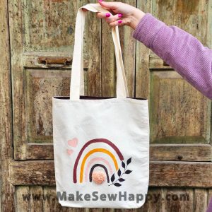 کیف توت بگ طرح رنگین کمان و برگ و قلب نارنجی