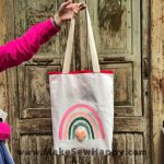 کیف توت بگ طرح رنگین کمان صورتی و قلب صورتی کم‌رنگ