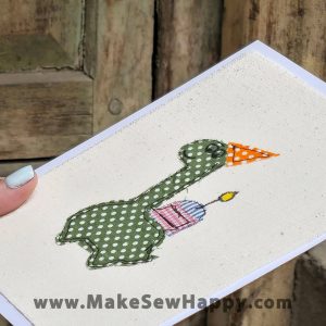 کارت پستال پارچه‌ای طرح کیک تولد و دایناسور سبز