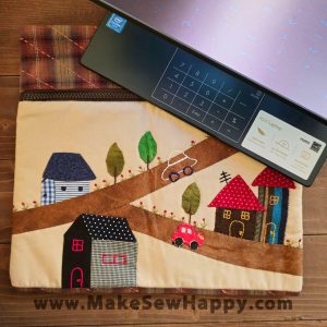 کیف لپتاپ پارچه‌ای طرح خونه