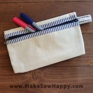 جامدادی پارچه‌ای طرح ساده رنگ سفید و سرمه‌ای