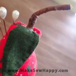 جا سوزنی پارچه‌ای مدل گلابی قرمز طرح درخت