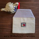 دستگیره آشپزخانه پارچه‌ای مدل خانه طرح سیب رنگ سفید