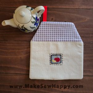 دستگیره آشپزخانه پارچه‌ای مدل خانه طرح سیب رنگ سفید