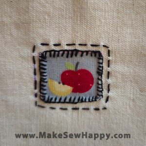 دستگیره آشپزخانه پارچه‌ای مدل خانه طرح سیب رنگ سفید