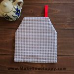 دستگیره آشپزخانه پارچه‌ای مدل خانه طرح سیب رنگ سفید