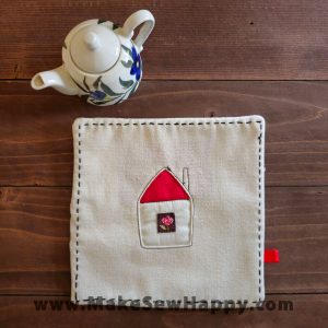 دستگیره آشپزخانه پارچه‌ای مدل خانه طرح گل رز رنگ سفید