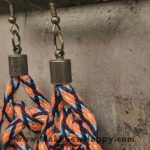 گوشواره نخی بافت رنگ نارنجی و سرمه‌ای و آبی روشن