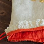 جا عینکی پارچه‌ای طرح گل‌دوزی نارنجی