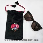 جا عینکی مخمل شماره‌دوزی شده رنگ مشکی و قرمز