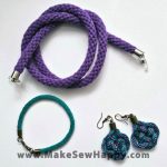 ست کادویی بند عینک و دستبند و گوشواره بافت رنگ بنفش و سبز