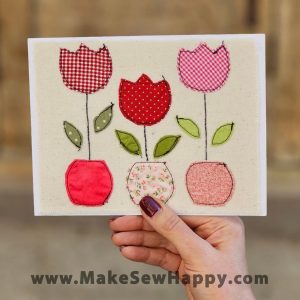 کارت پستال پارچه‌ای طرح سه گلدان گل قرمز