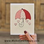 کارت پستال پارچه‌ای طرح چتر و قلب‌های صورتی